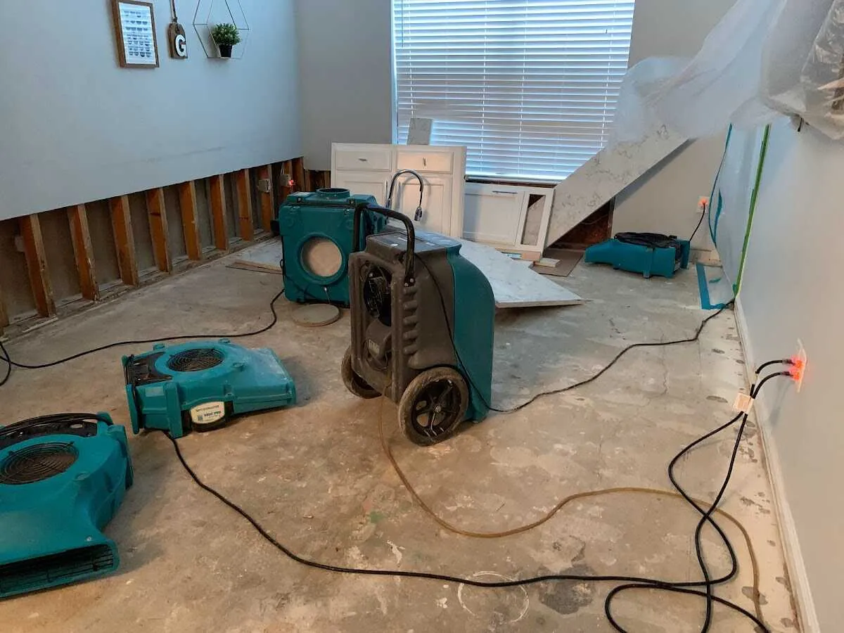 Dehumidifier in flood-cut room for Water Damage Restoration in Jennings